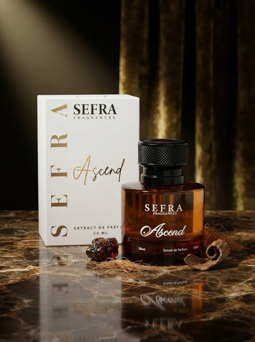 Ascend white box and amber bottle on dark marble