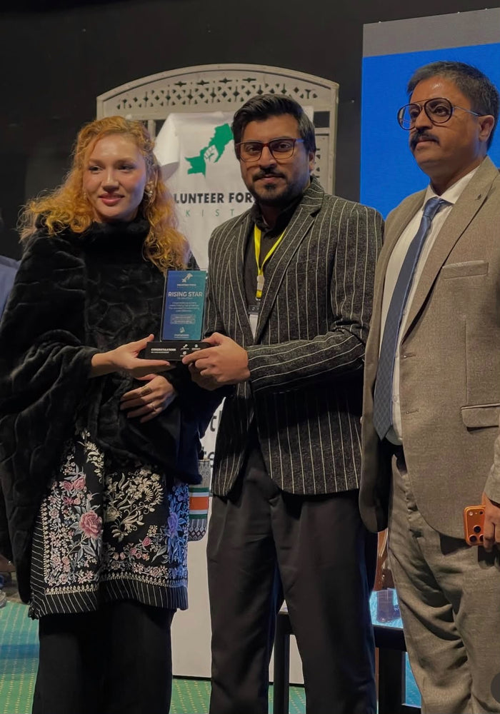 Receiving the Rising Star of Pakistan award on stage